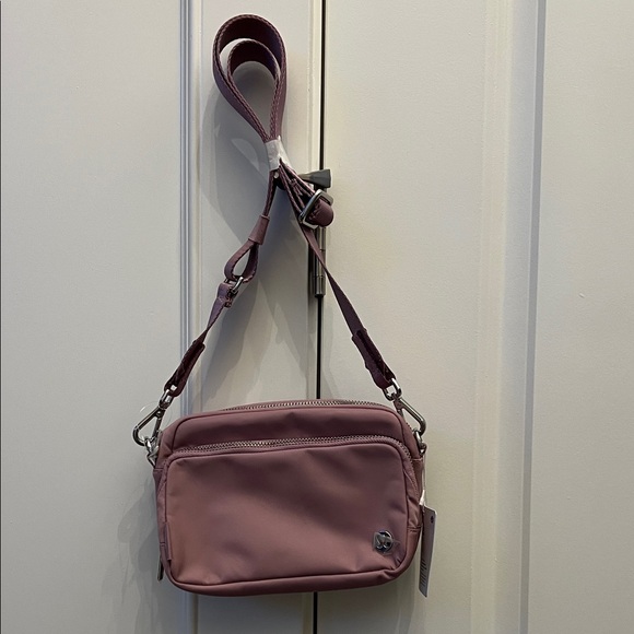 lululemon athletica Handbags - Lululemon Rose Blush Everywhere Crossbody Bag with Metal Hardware
